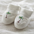 white pima cotton booties with palm tree