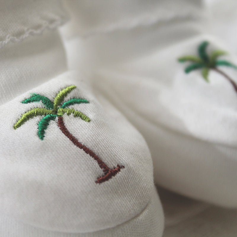 white pima cotton booties with palm tree