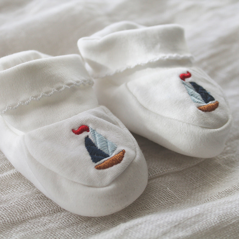 white pima cotton booties with sailboat