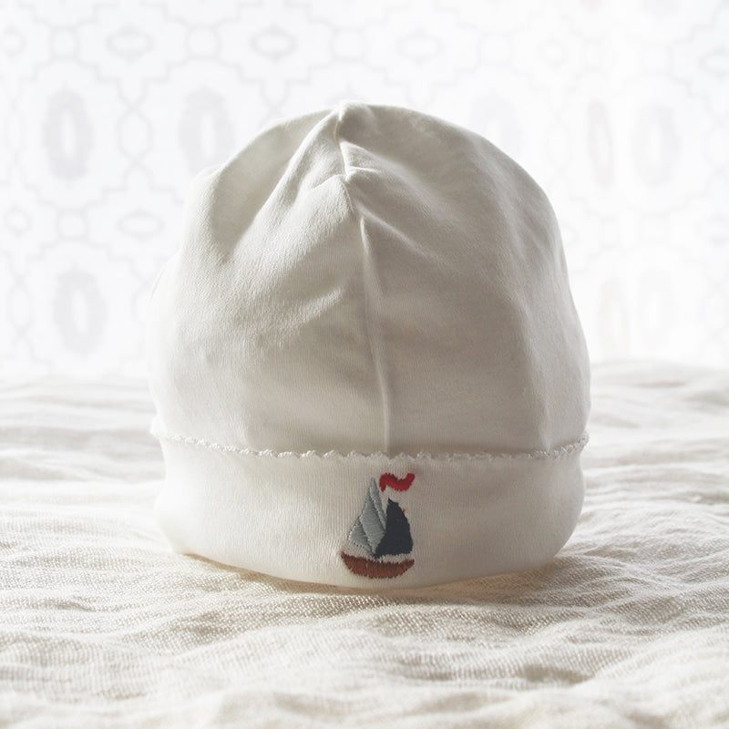 white pima cotton beanie with sailboat