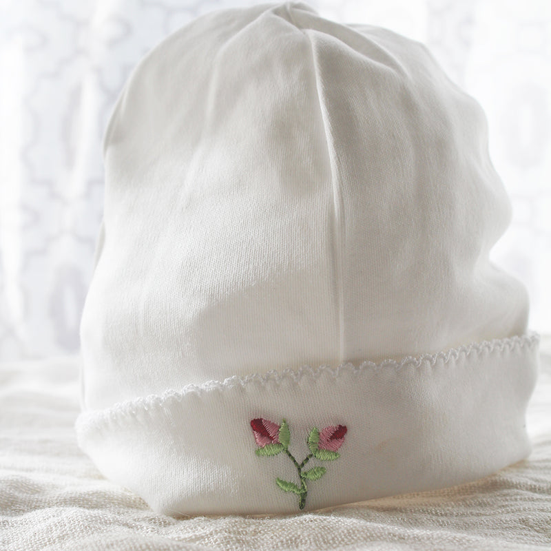 white pima cotton beanie with rosebuds