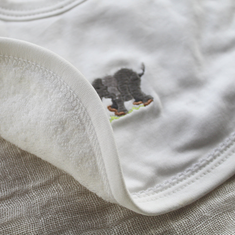 white cotton bib with elephant