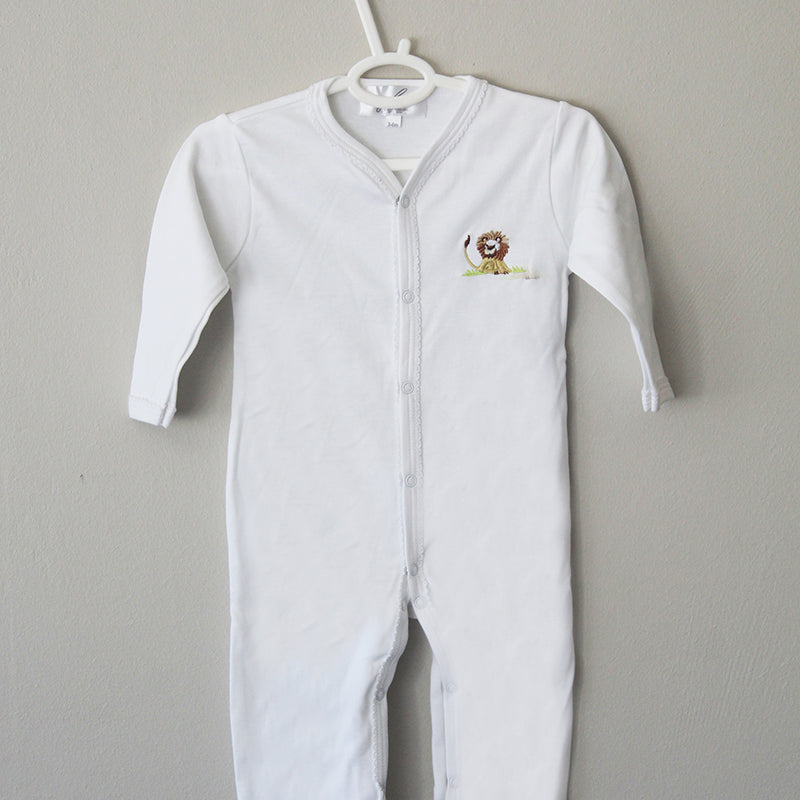 white cotton onesie with lion