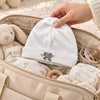 Safari Elephant. A charming embroidered elephant. The elephant, a symbol of love, strength, wisdom and family, makes this beanie an especially meaningful gift.