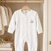 Rosebuds. A delicately embroidered rosebud. Understated floral embroidery in the timeless Gordonsbury tradition.