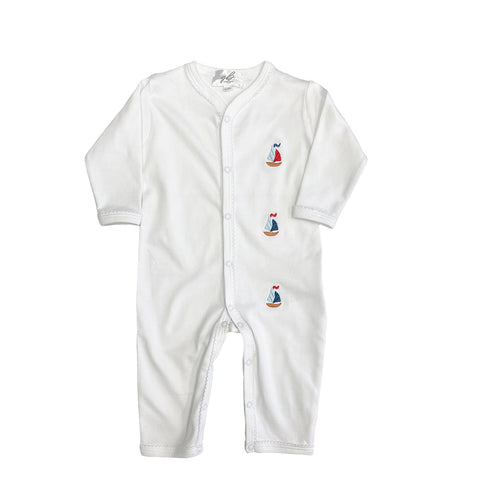 white cotton onesie with sailboats